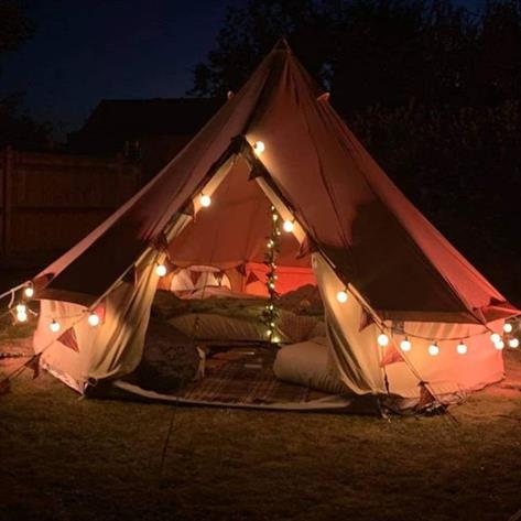 4m bell tent at night