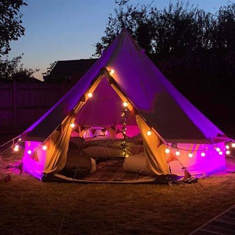 5m bell tent lit in pink