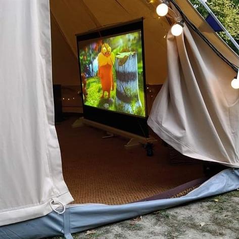 Bell tent with cinema screen